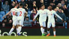 Sturridge y Firmino celebran uno de los goles del Liverpool