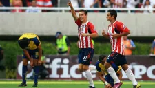 Cubo Torres festejando una anotación en el Clásico Nacional