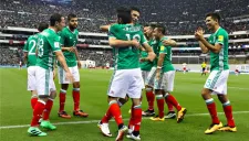 Jugadores celebran durante el juego contra Canadá en las eliminatorias rumbo a Rusia 2018