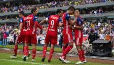 Jugadores de Chivas celebran un gol en la Liguilla