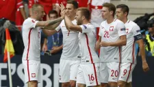 Jugadores de Polonia celebran el pase a Cuartos de Final