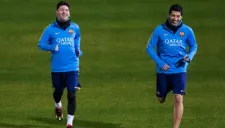 Luis Suárez junto a Lionel Messi durante un entrenamiento del Barcelona