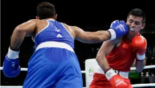 Romero recibe un golpe durante su combate contra Mangiacarpe