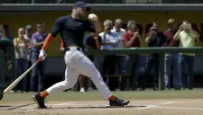 Tim Tebow se pone al bat