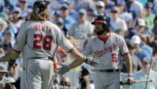 Werth y Rendon celebran una carrera de los Nacionales de Washington