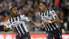 Dorlan Pabón y Funes Mori festejan un gol