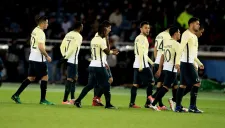 Jugadores de América en el encuentro por el tercer lugar