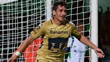 Berjón festeja una anotación con los universitarios