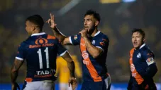 Jugadores del Puebla celebran una anotación