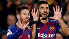 Messi y Suárez celebran una anotación ante el Eibar