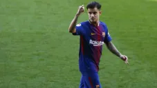 Coutinho festeja en un juego con el Barcelona