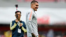 Nico Castillo en el calentamiento con América