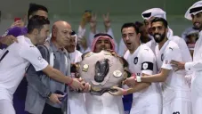 Xavi festeja junto a sus compañeros el campeonato de Liga