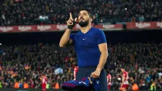Luis Suárez festeja gol contra el Atlético de Madrid