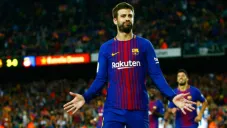 Piqué en un partido con el Barcelona