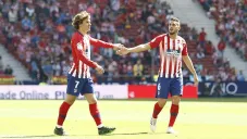Griezmann celebra con Koke un gol del Atlético