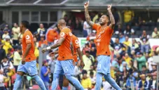 Jugadores celebran anotación del América