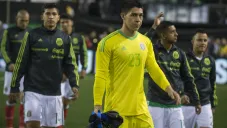 Hugo González durante un juego con México