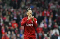 Firmino festeja en un partido de Champions