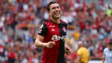 Juan Pablo Vigón festeja un gol con Atlas