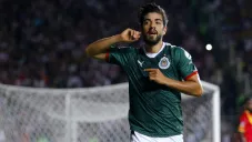 Rodolfo Pizarro celebra una anotación frente a Morelia