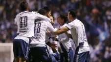 Jugadores del Puebla en festejo de gol