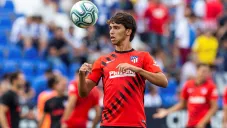 Félix calienta previo a un juego del Atlético de Madrid