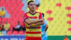 Carlos Ferreria celebrando su anotación con Monarcas