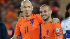 Sneijder con Robben en un juego con Holanda
