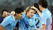Forlán, Suárez y Godín celebran una anotación en Sudáfrica
