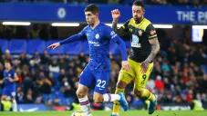 Pulisic durante un duelo con el Chelsea