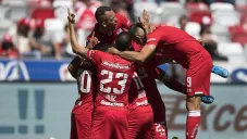 Jugadores de Toluca festejan un gol