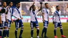 Jugadores de Puebla antes de un partido