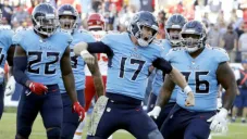 El quarterback de Tennessee festeja un touchdown