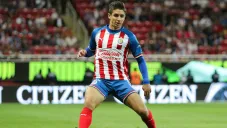 Isaac Brizuela en partido con Chivas
