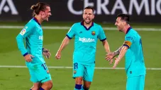 Griezmann festeja un gol con Lionel Messi en LaLiga