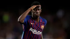Ousmane Dembélé durante un duelo con el Barcelona
