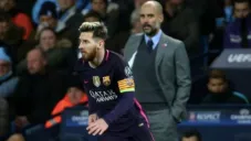 Guardiola observando a Messi