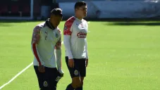 Cristian Calderón y Ronaldo Cisneros en un entrenamiento