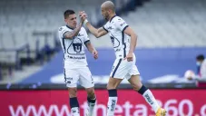 Iturbe y González en un partido de Pumas