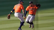 Springer y Correa celebran el triunfo