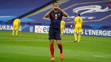 Olivier Giroud celebra uno de sus goles ante Ucrania