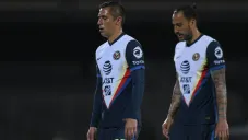 Emanuel Aguilera y Paul Aguilar en acción con América