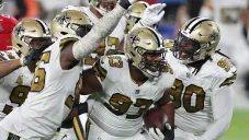 Jugadores de los Saints celebran ante Tampa Bay