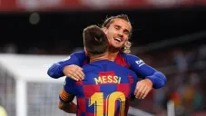 Lionel Messi y Antoine Griezmann en un partido del Barcelona