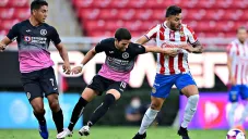 Rivero y Vega en un partido del Guardianes 2020