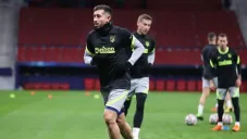 Héctor Herrera calentado con el Atlético de Madrid