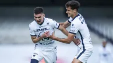 Johan Vásquez y Juan Dinenno en festejo