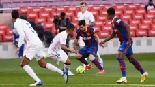 Lionel Messi en un partido entre el Barcelona y el Real Madrid