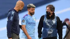 Pep Guardiola y Kun Agüero durante un duelo del City